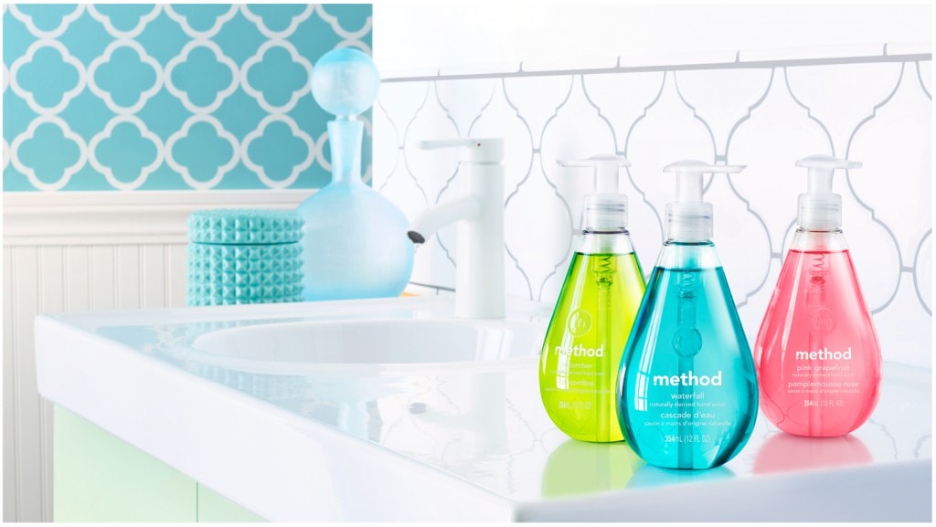 beauty shot hand soap on sink pink green waterf